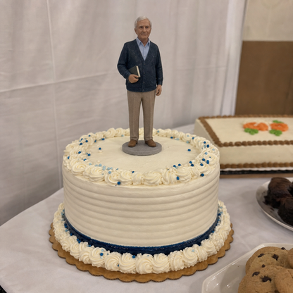 Birthday cake topper figurine from photo with finished display angle – AI-generated concept rendering